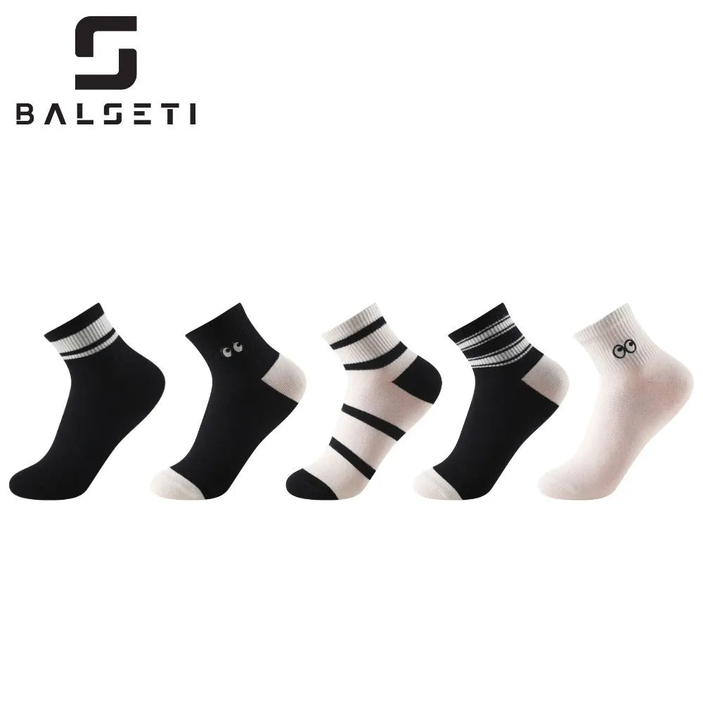 Calcetines tobilleros a rayas blancas y negras con ojitos