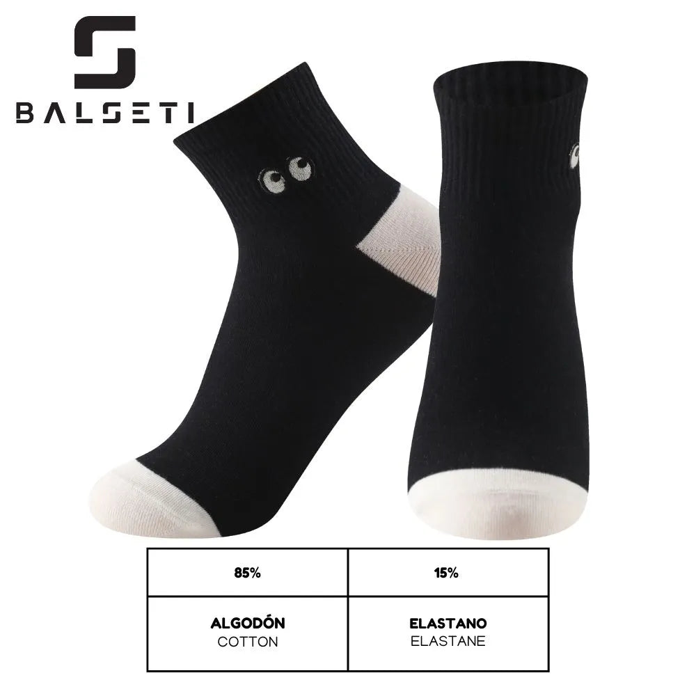Calcetines tobilleros a rayas blancas y negras con ojitos