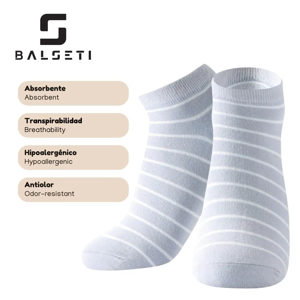 Calcetines tobilleros a rayas sobre varios colores